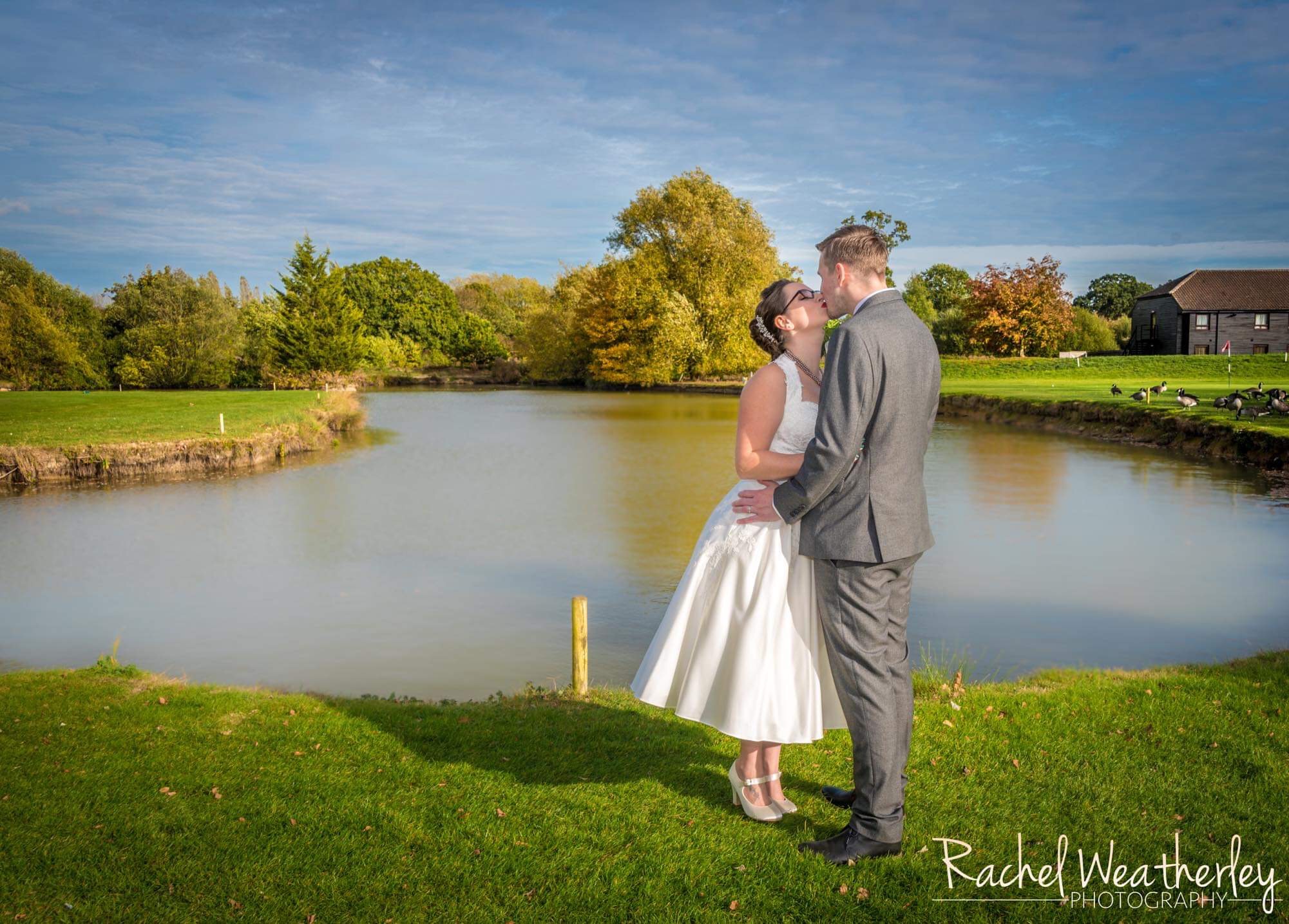 Jemma Real Bride wearing eliza halterneck 1950s inspired short wedding dress
