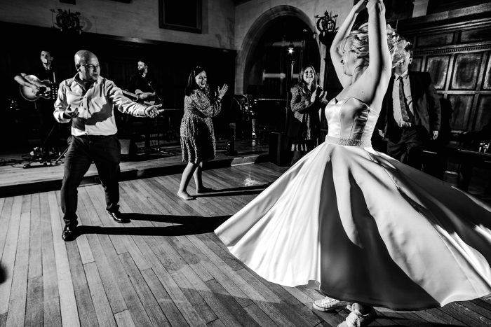 tea length wedding dress. Bride spinning.